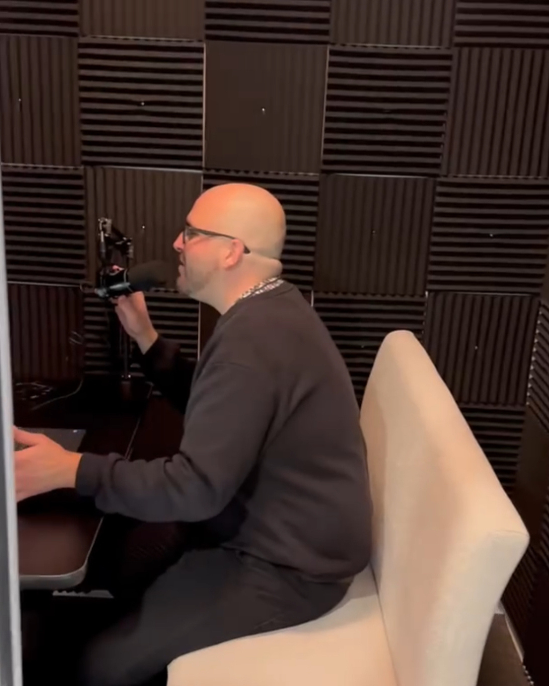 A resident recording in the podcast studio at The Pulse OKC.